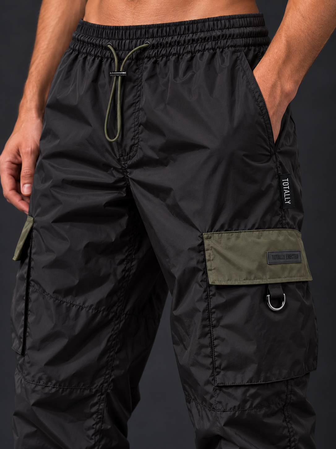 Black cargo trousers with olive flaps